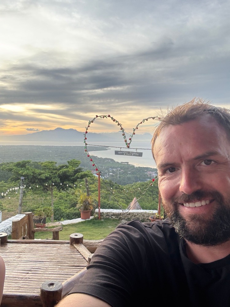 Dan on a hilltop